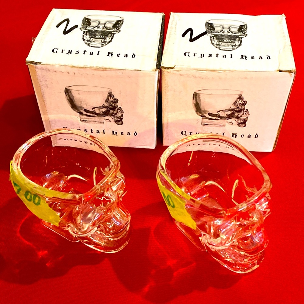 A set of four crystal head skull shot glasses